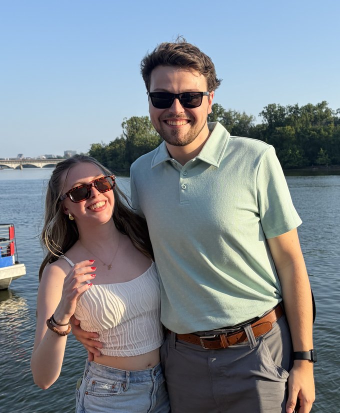 Jacob and his girlfriend on a dock by the water